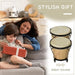Mother and child on sofa with wrapped gift, natural bongo drum set, stylish gift idea