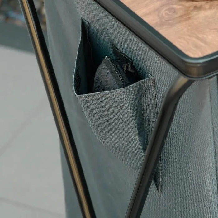 Grey camp kitchen unit with MDF worktop, aluminium frame, and fabric side pocket storage