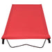 Red portable camping bed with folding steel frame on white background
