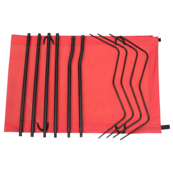 Red portable folding camping bed with black steel frame parts laid out flat