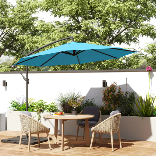 Blue patio umbrella over a wooden table with chairs on a patio