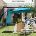 Blue patio umbrella with manual crank mechanism in an outdoor setting