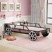 Children's room with a unique bed design resembling a car, pink walls, and decorative elements.