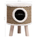 Brown seagrass cat house with white faux fur trim, elevated on wooden legs, round entrance