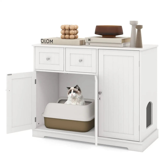 White cat litter cabinet with open door showing cat inside covered litter box, decorative items on top