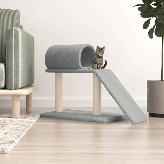 Tabby cat on light grey cat scratching post with tunnel and ramp in modern living room