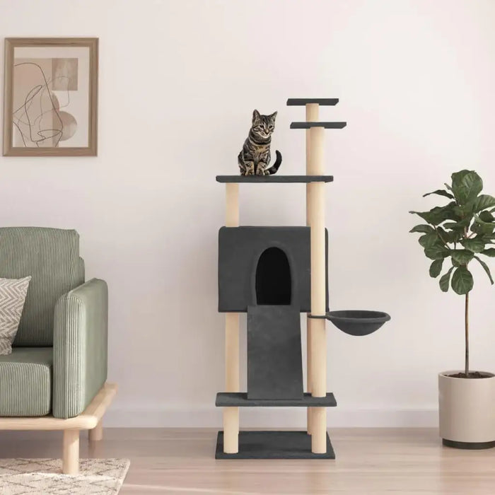 Tabby cat on dark grey multi-level cat tree with house and ladder in modern living room
