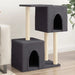 Dark grey multi-level cat tree with sisal posts and platforms in a modern living room