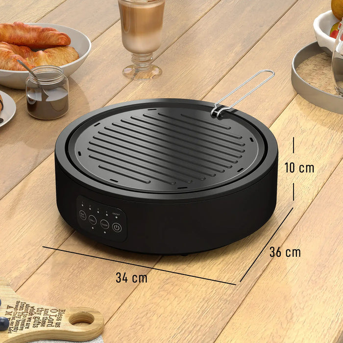 Black electric ceramic hob and grill with controls on wooden table, dimensions labeled 34x36x10 cm