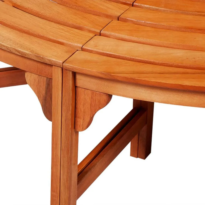 Close-up of circular wooden tree bench made from eucalyptus hardwood with oil finish