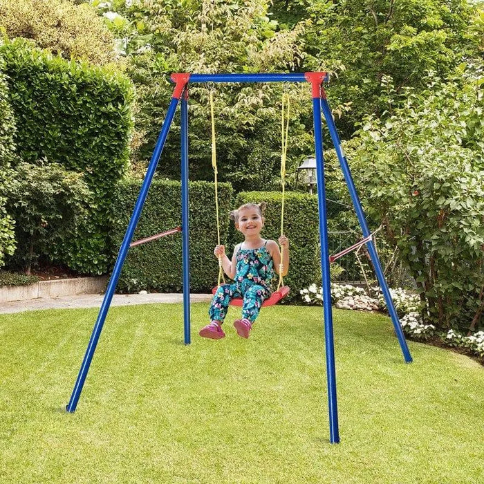 Child on blue metal garden swing with U-shaped seat and adjustable ropes in backyard