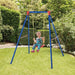 Child on blue metal garden swing with U-shaped seat and adjustable ropes in backyard
