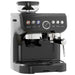 Black espresso machine with a clear bean container on a white background