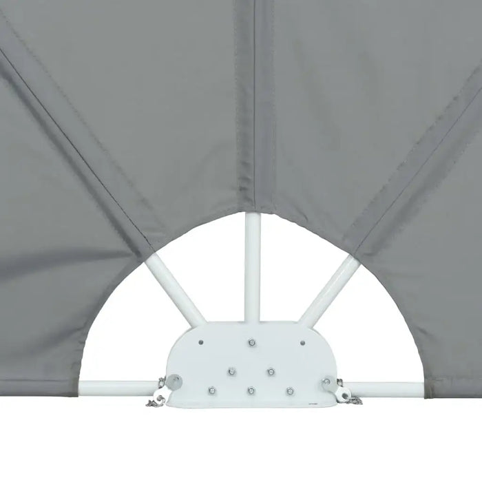 Close-up of grey collapsible side awning with white metal frame for balcony privacy