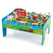 Colorful wooden train table with 84-piece train set and activity accessories for kids