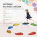 Girl balancing on colorful crocodile stepping stones set for kids obstacle course