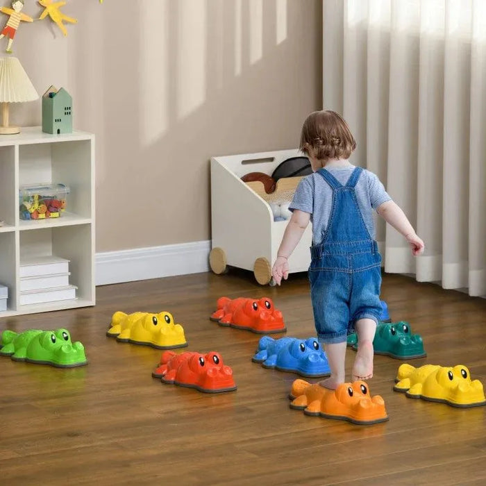 Child balancing on colorful crocodile stepping stones in a playroom with wooden floor