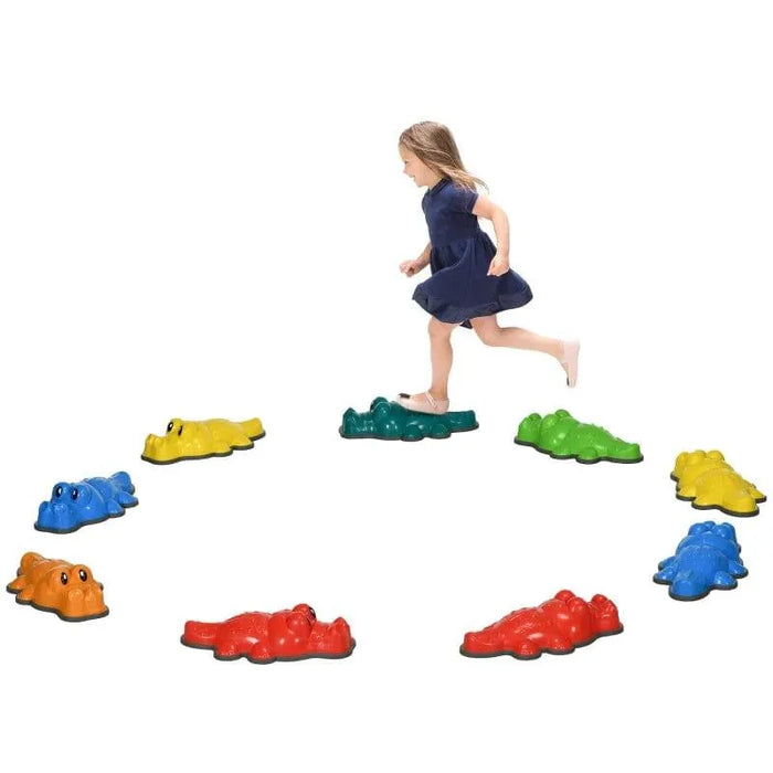 Girl playing on colorful crocodile balance stepping stones for kids