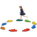 Girl playing on colorful crocodile balance stepping stones for kids