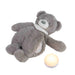 Grey cry-activated sleep aid teddy bear with white night light on white background