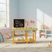 Deluxe wooden kids workbench with blackboard, toy tools and blocks in a playroom
