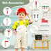 Smiling child in red hard hat with wooden workbench toy, tool station, and labeled accessories