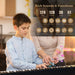 Woman teaching young boy to play electronic keyboard piano with 61 keys and multiple sound features