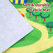 Children's play mat with cartoon design and text 'Soft & Durable Fabric Mat'.