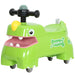 Green toy vehicle with a smiling face on a white background