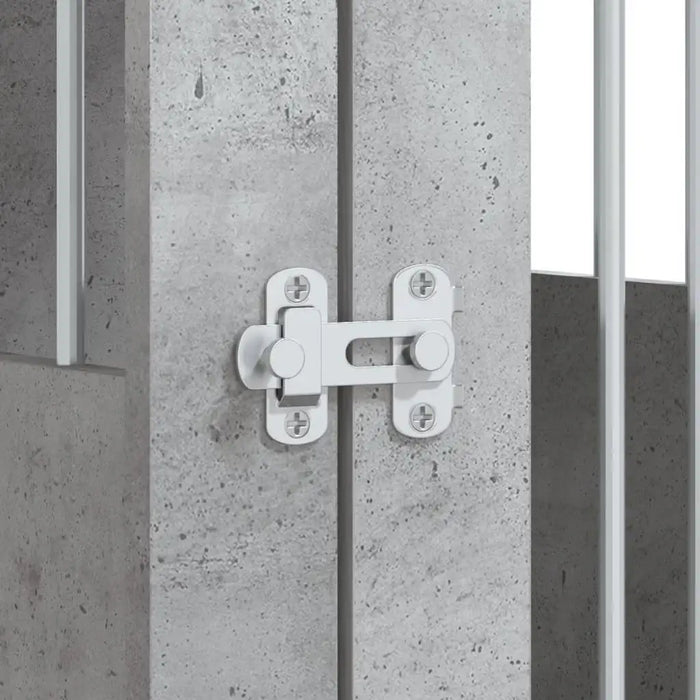 Close-up of concrete grey dog crate furniture with metal latch and bars