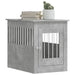 Concrete grey dog crate furniture end table with books and potted cactus on top