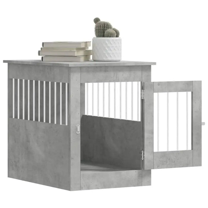 Concrete grey dog crate furniture with open door, books, and plant on top