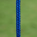 Close-up of a blue braided swing set rope against a blurred green background