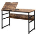 Adjustable industrial drafting table with rustic wood top and black metal frame
