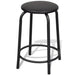 Black metal drafting stool with round seat and footrest, industrial design on white background