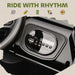 Control panel of a vehicle with 'Ride with Rhythm' text and icons on a beige background