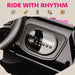 Close-up of a motorcycle headlight with control panel, featuring text 'Ride with Rhythm' and icons.
