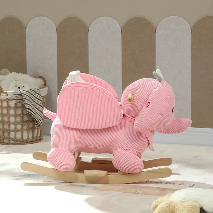 Pink rocking elephant toy in a child's room with a basket of toys in the background.