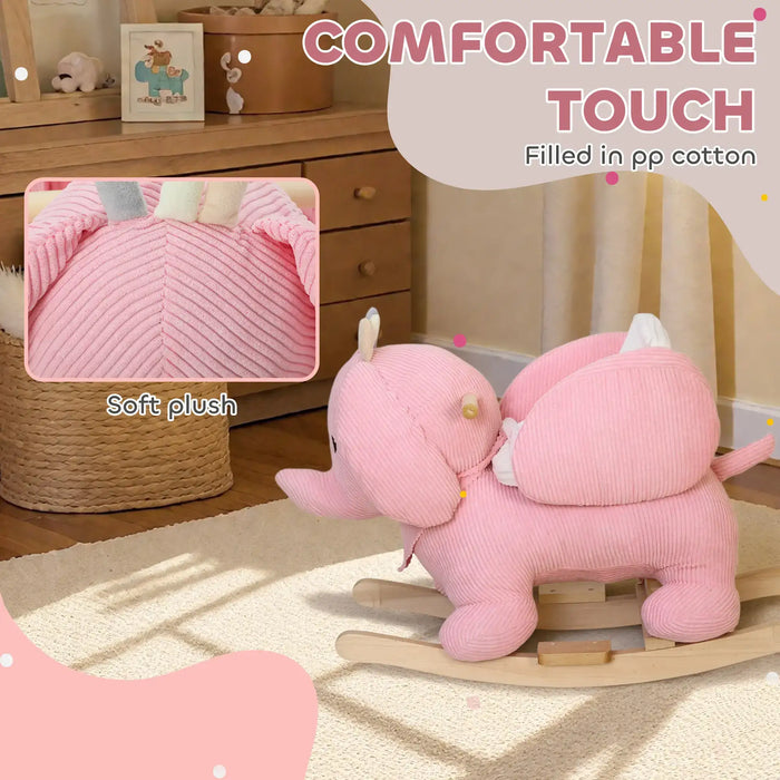 Pink plush elephant toy on a wooden base with 'Comfortable Touch' text and close-up of soft material.
