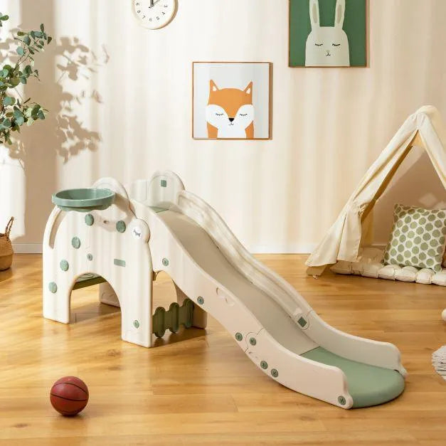 Elephant-themed toddler activity centre with slide and crawl tunnel in a playroom setting