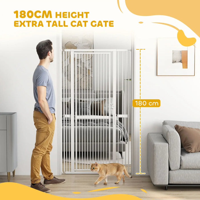 Extra tall 180cm white cat gate installed in doorway with man and walking cat in modern living room