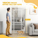 Extra tall 180cm white cat gate installed in doorway with man and walking cat in modern living room