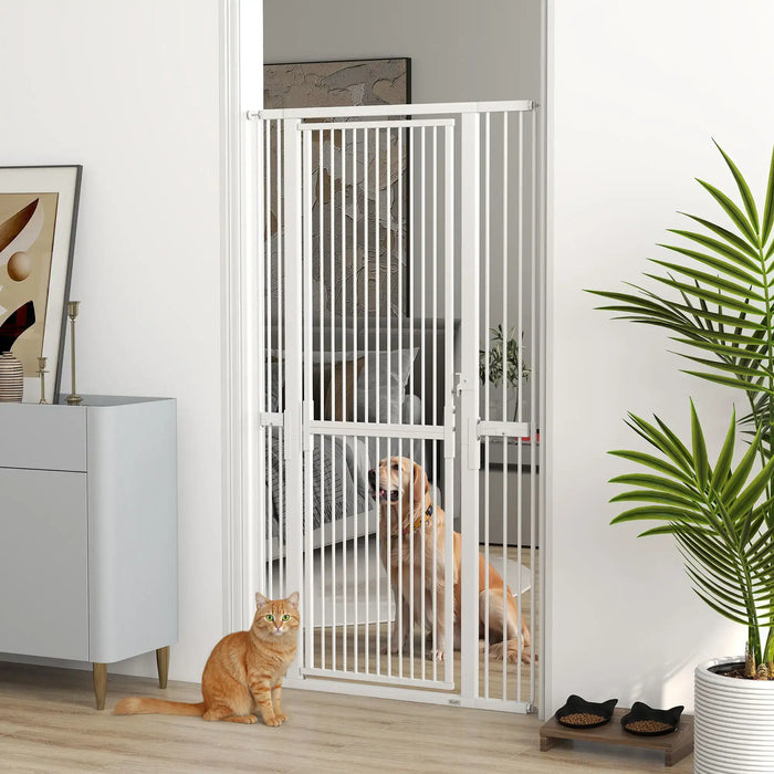 White metal pet gate installed in doorway separating dog in bedroom and cat outside in modern room