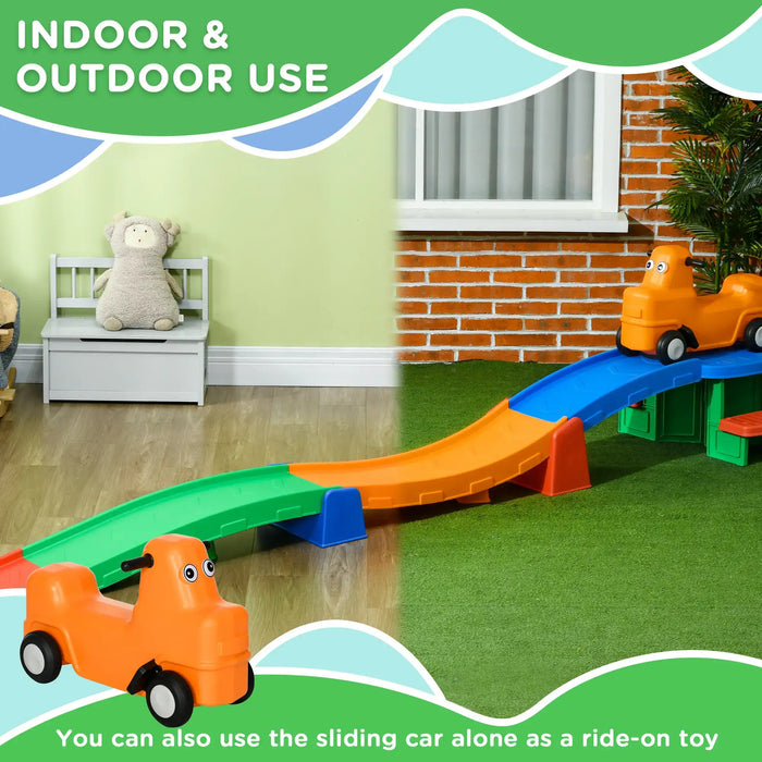 Children's toy track with orange cars on a green and brown floor, featuring text about indoor and outdoor use.