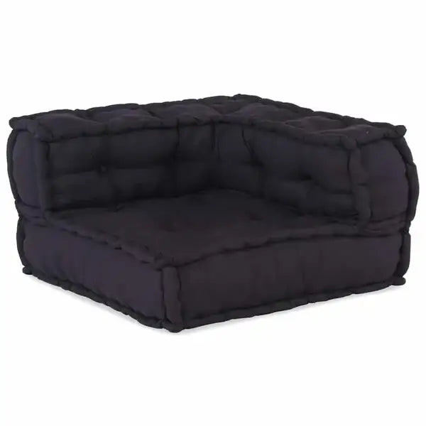Black quilted pet bed on a white background