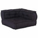 Black quilted pet bed on a white background