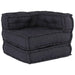 Black quilted pet bed on a white background