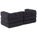 Black tufted sofa on a white background