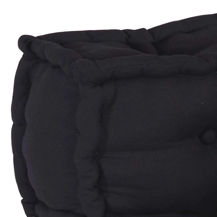 Black quilted bean bag chair on a white background