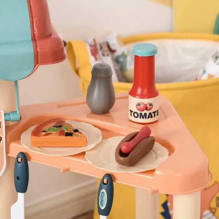 Toy fast food set with plastic pizza, hot dog, tomato sauce bottle and pepper shaker